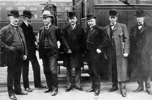 James H. Peabody with others in front of a train