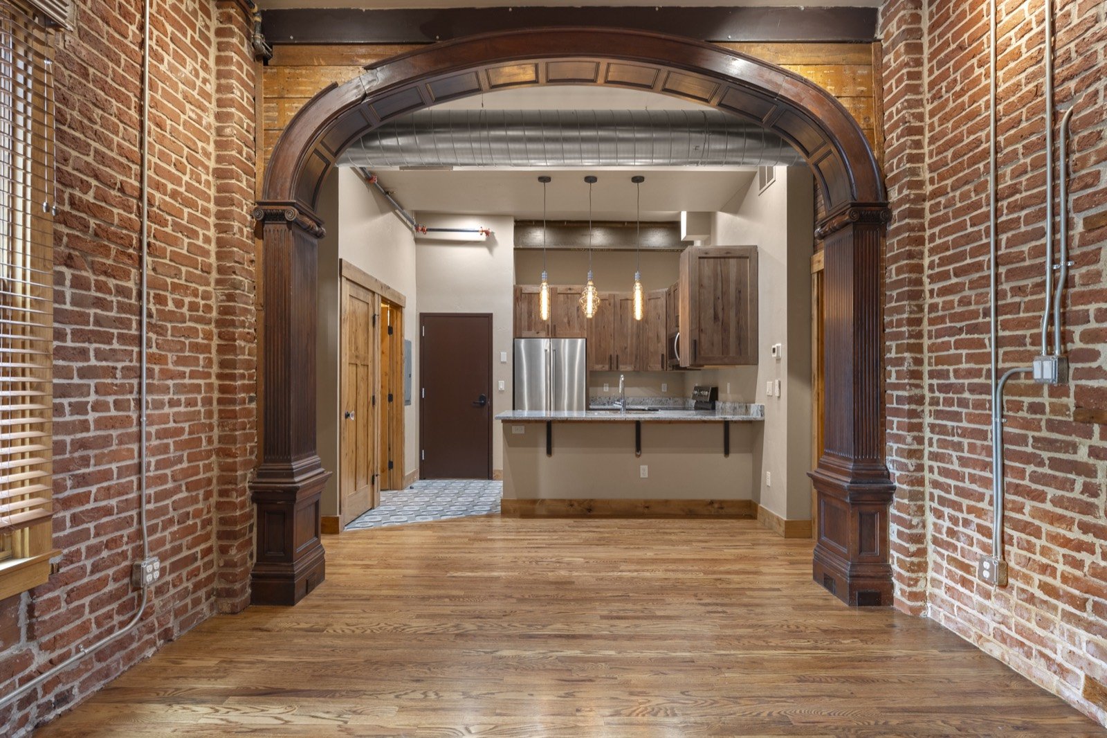 Through the Arch: Peabody Whitehead Mansion, Unit 100